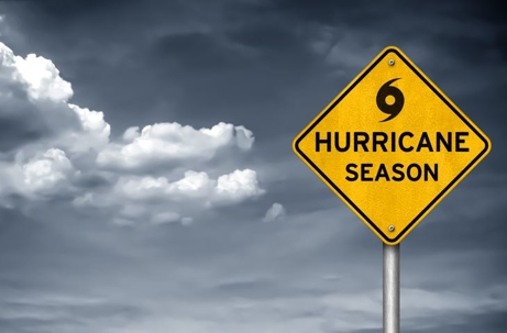 cloudy sky with hurricane season sign
